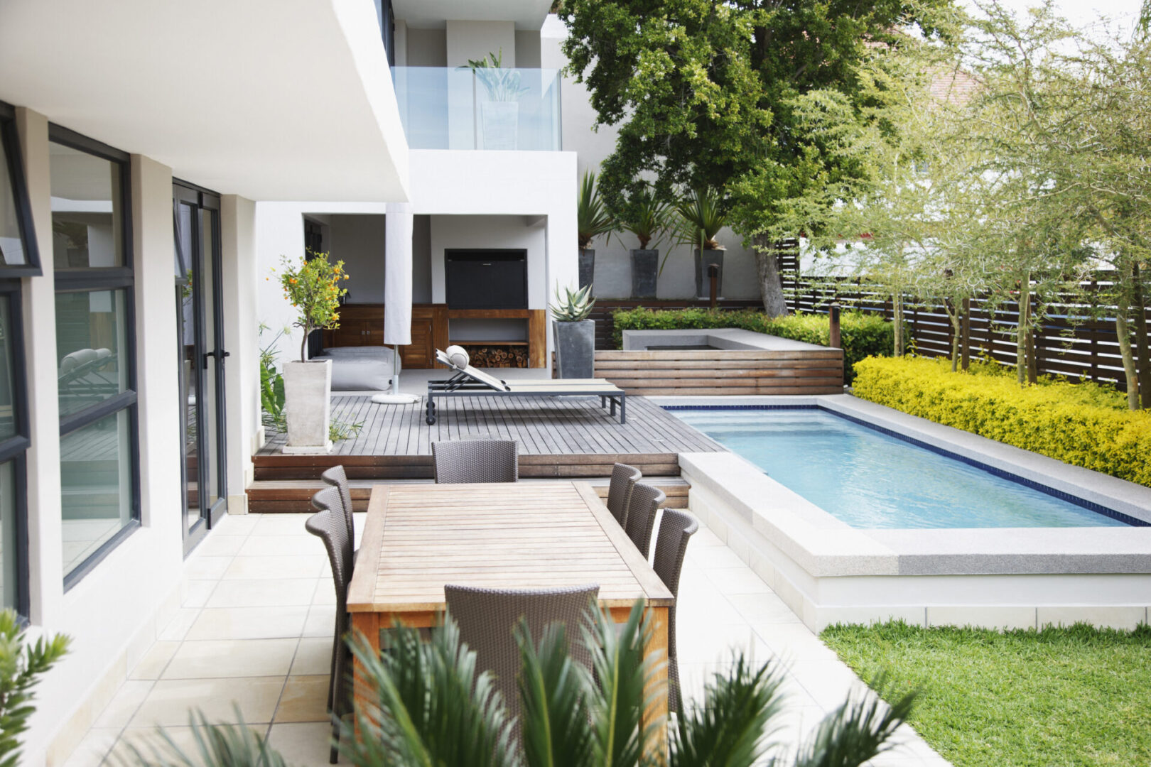 Luxury outdoor space with garden and pool