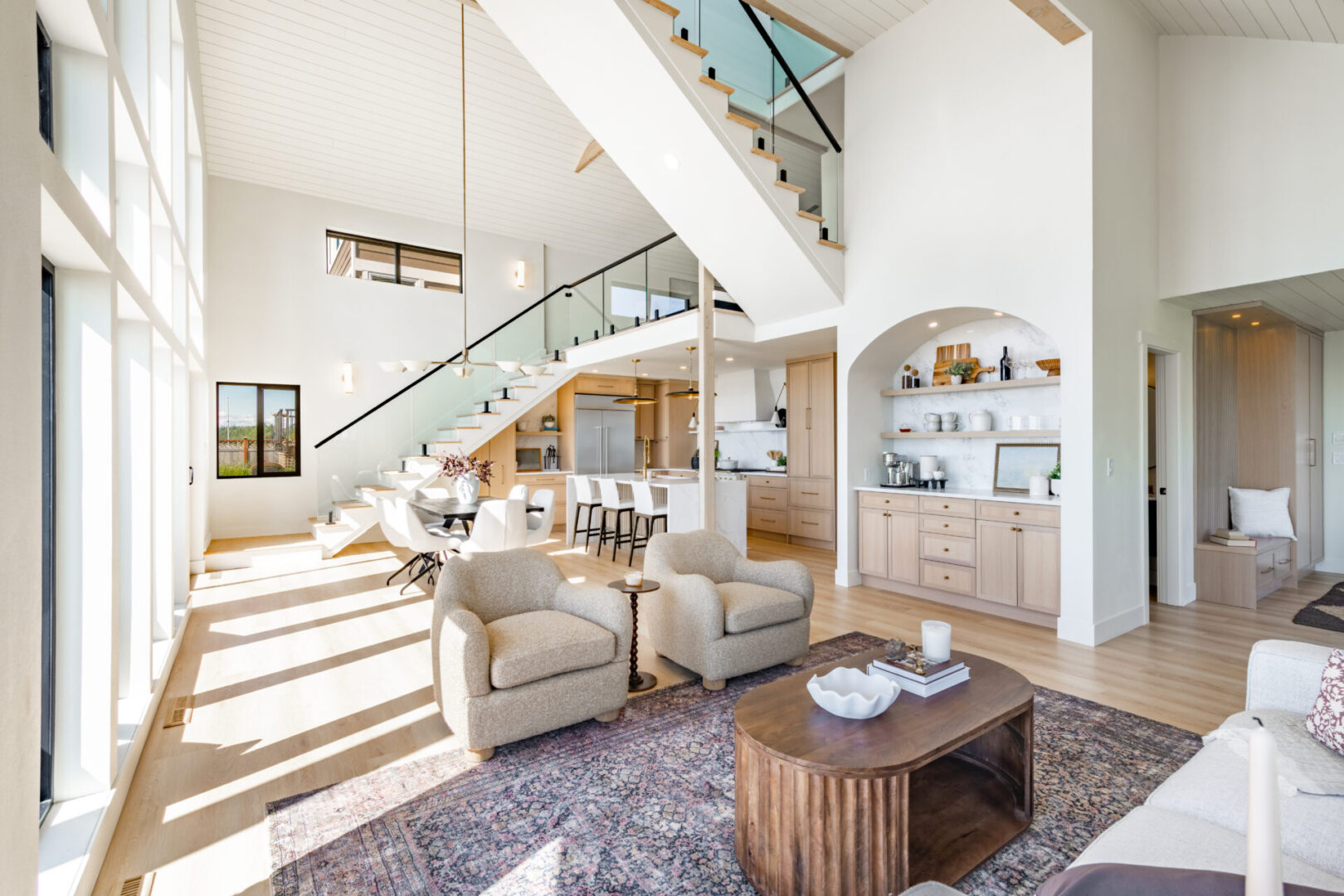 Contemporary home interior with glass railing