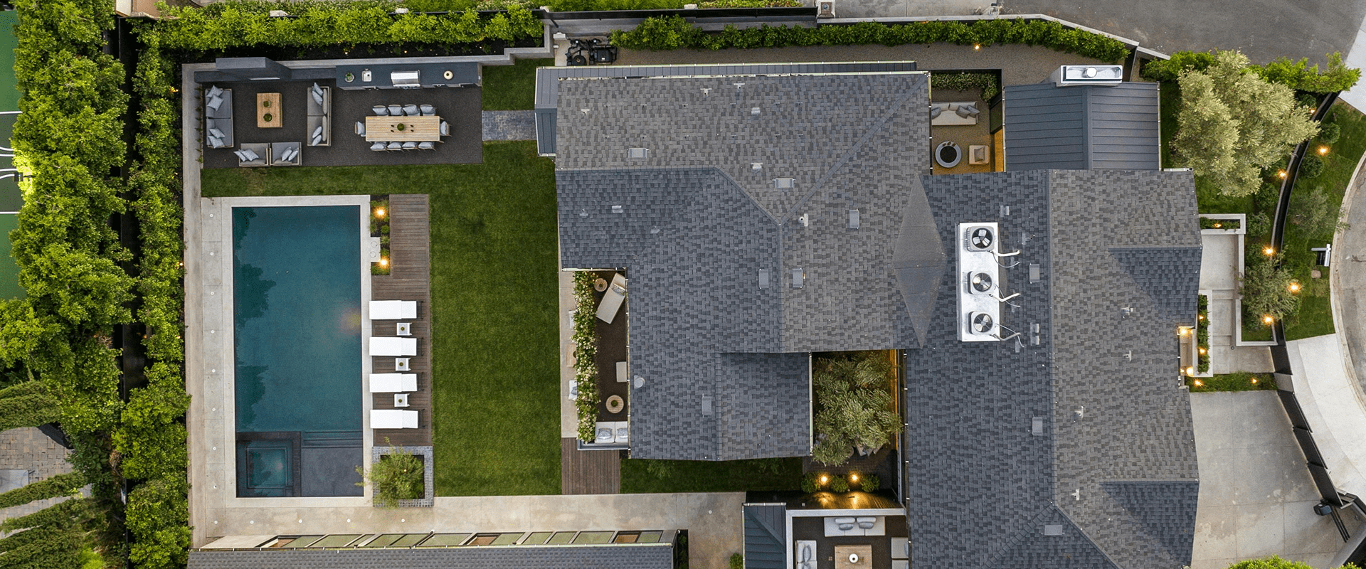 Aerial view of modern house with pool