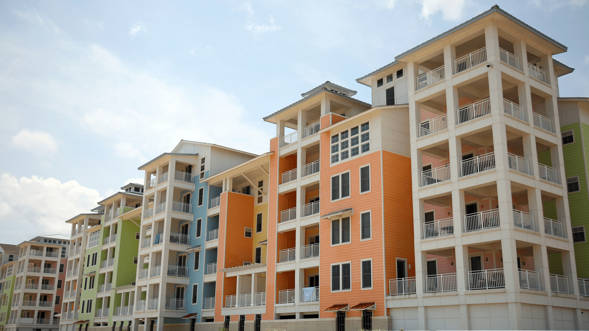 Colorful modern apartment buildings with balconies